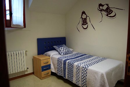 Logela - Dormitorio